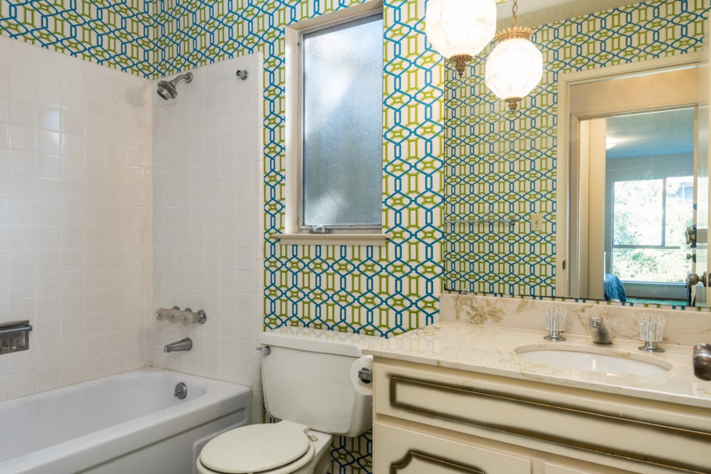 321 Middle Road Belmont, CA 94002 - Photo 13 of 17 a bathroom with a sink and a mirror
