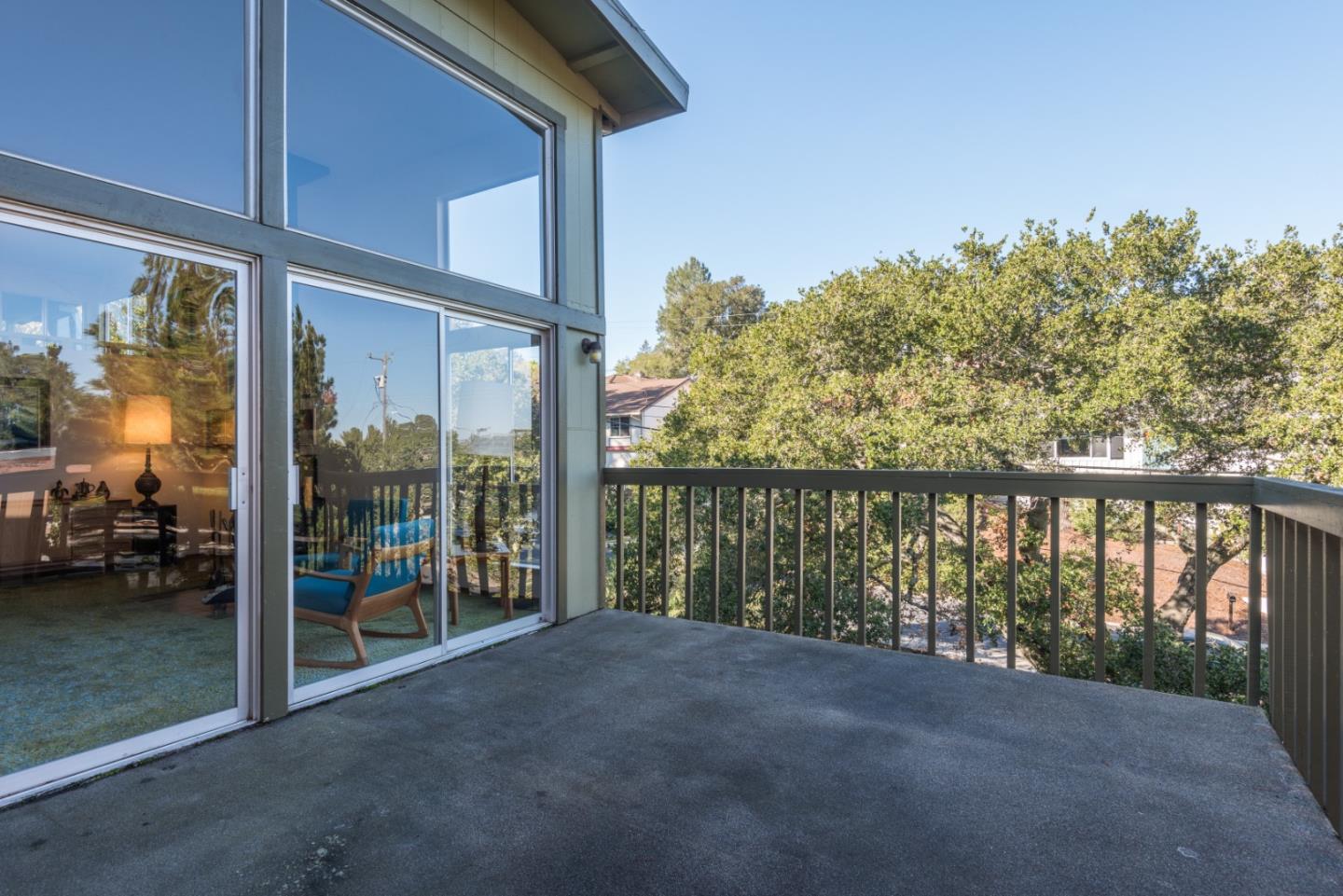 321 Middle Road Belmont, CA 94002 - Photo 16 of 17 a view of a porch with furniture and floor to ceiling window
