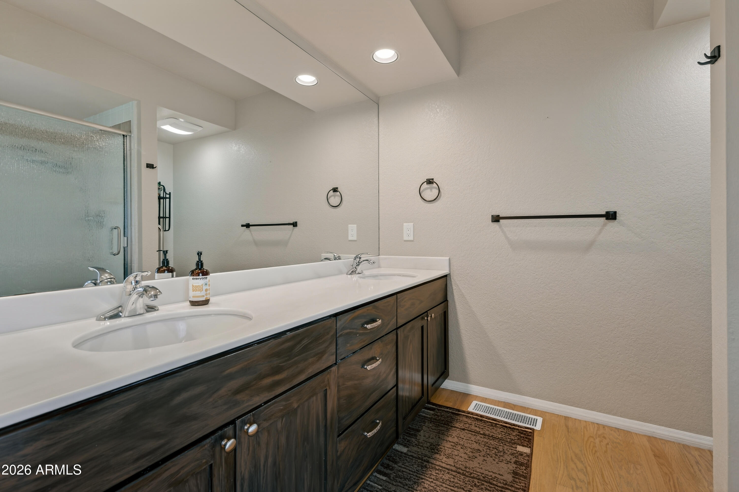 56 Red River Road Sedona, AZ 86351 - Photo 14 of 48 a bathroom with a double vanity sink and a mirror