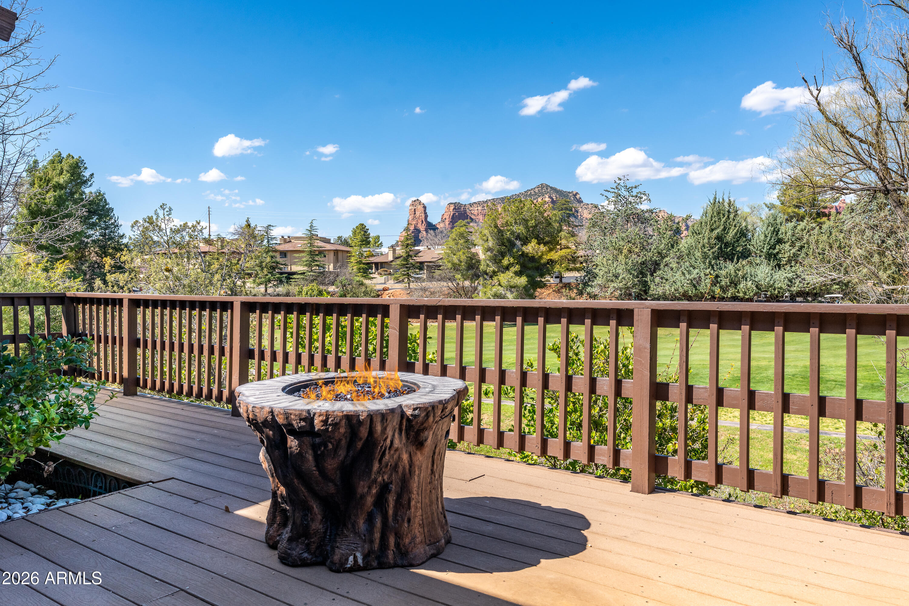 56 Red River Road Sedona, AZ 86351 - Photo 25 of 48 a view of a chairs and table on the deck