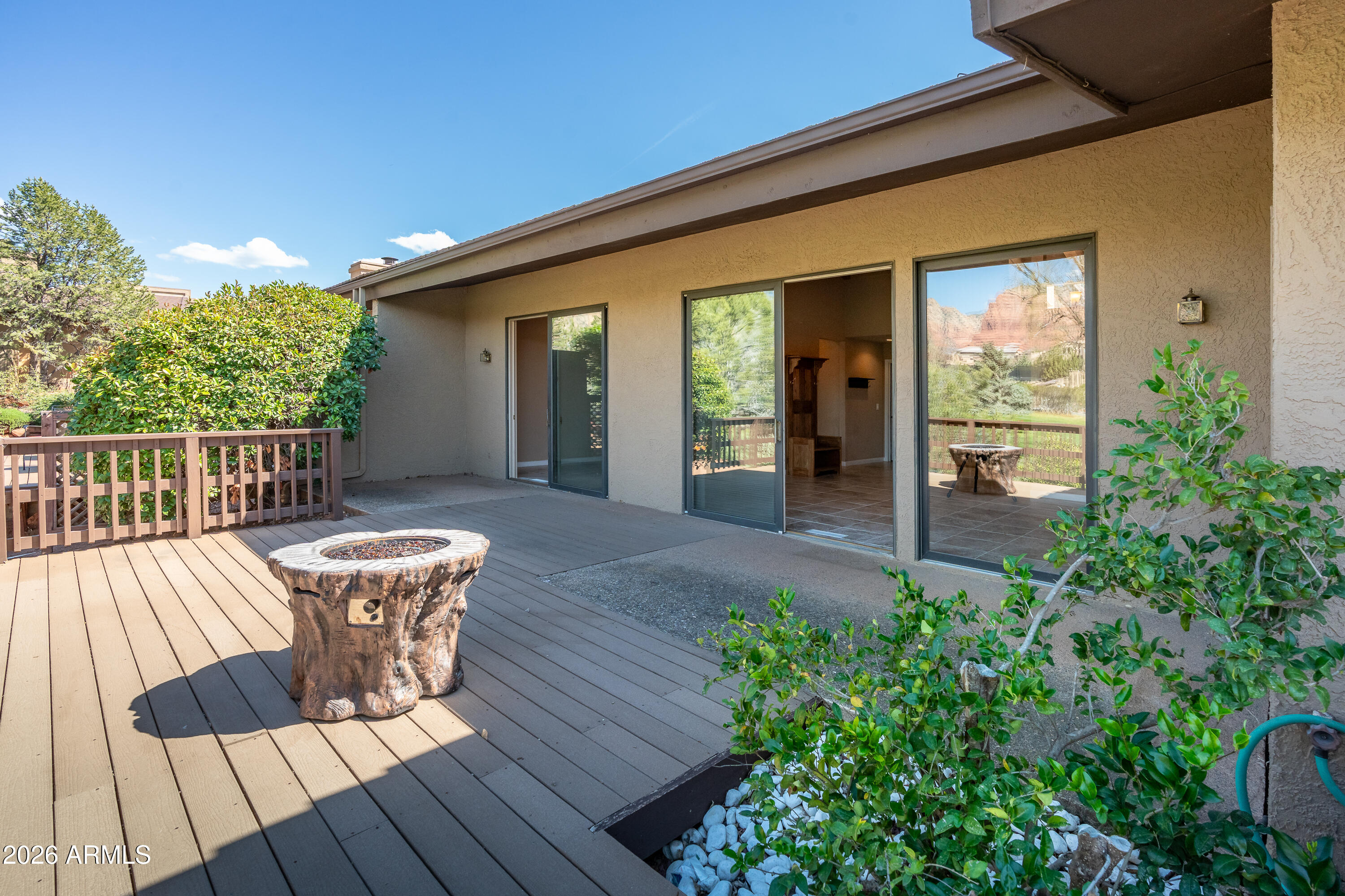 56 Red River Road Sedona, AZ 86351 - Photo 26 of 48 a view of a house with backyard and sitting area