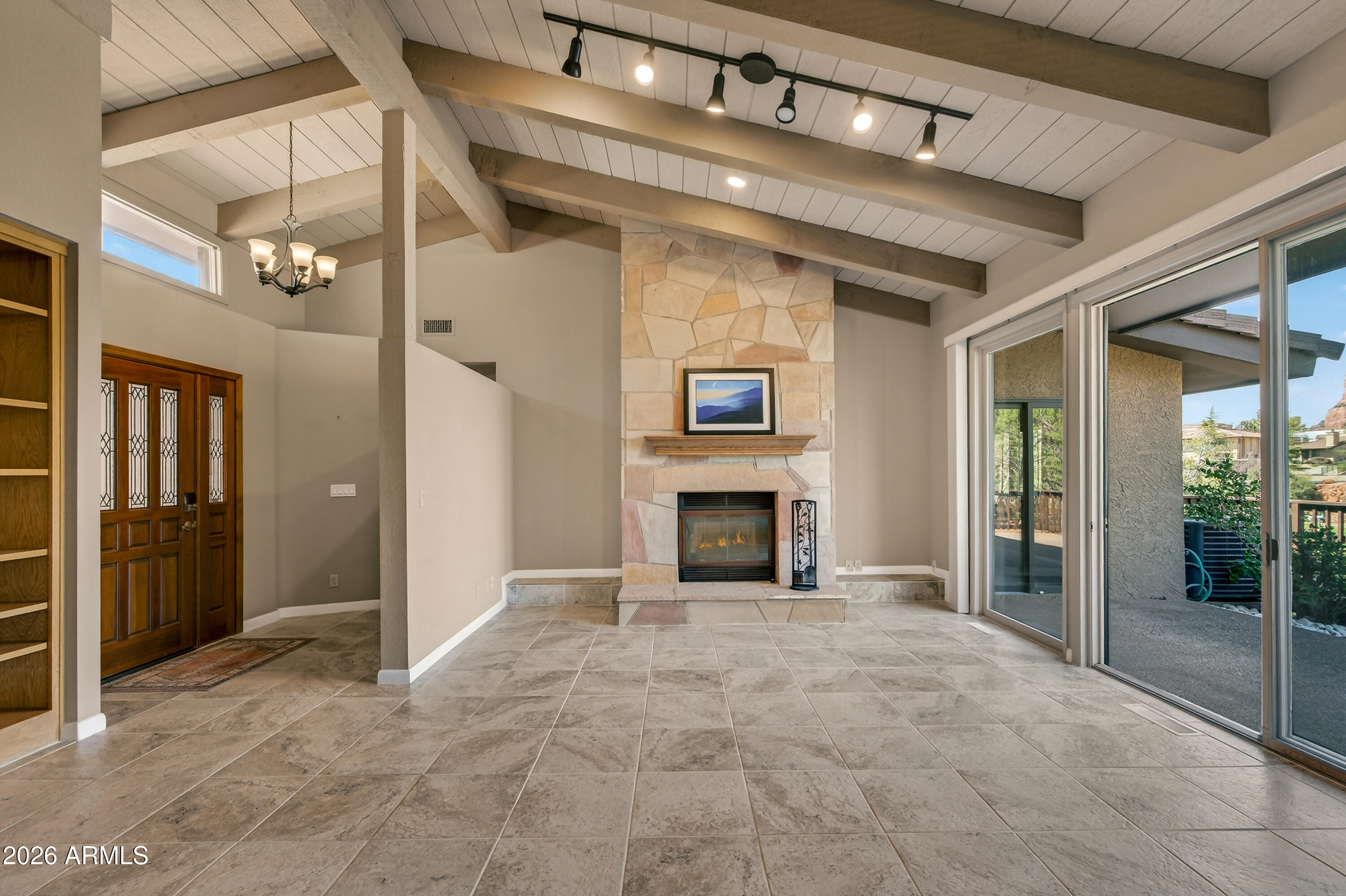 56 Red River Road Sedona, AZ 86351 - Photo 4 of 48 a view of an empty room with a fireplace