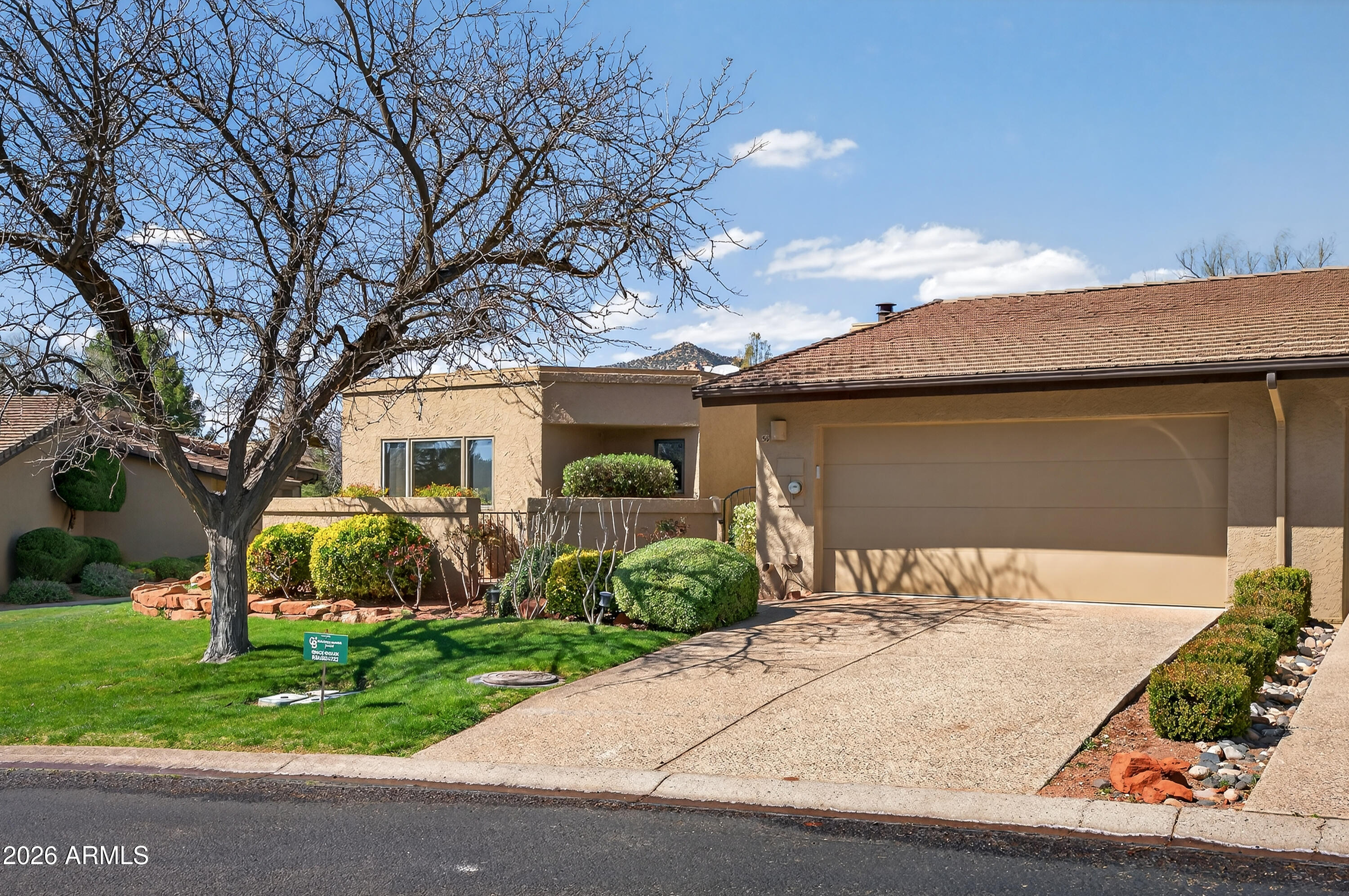 56 Red River Road Sedona, AZ 86351 - Photo 46 of 48 a front view of a house with garden