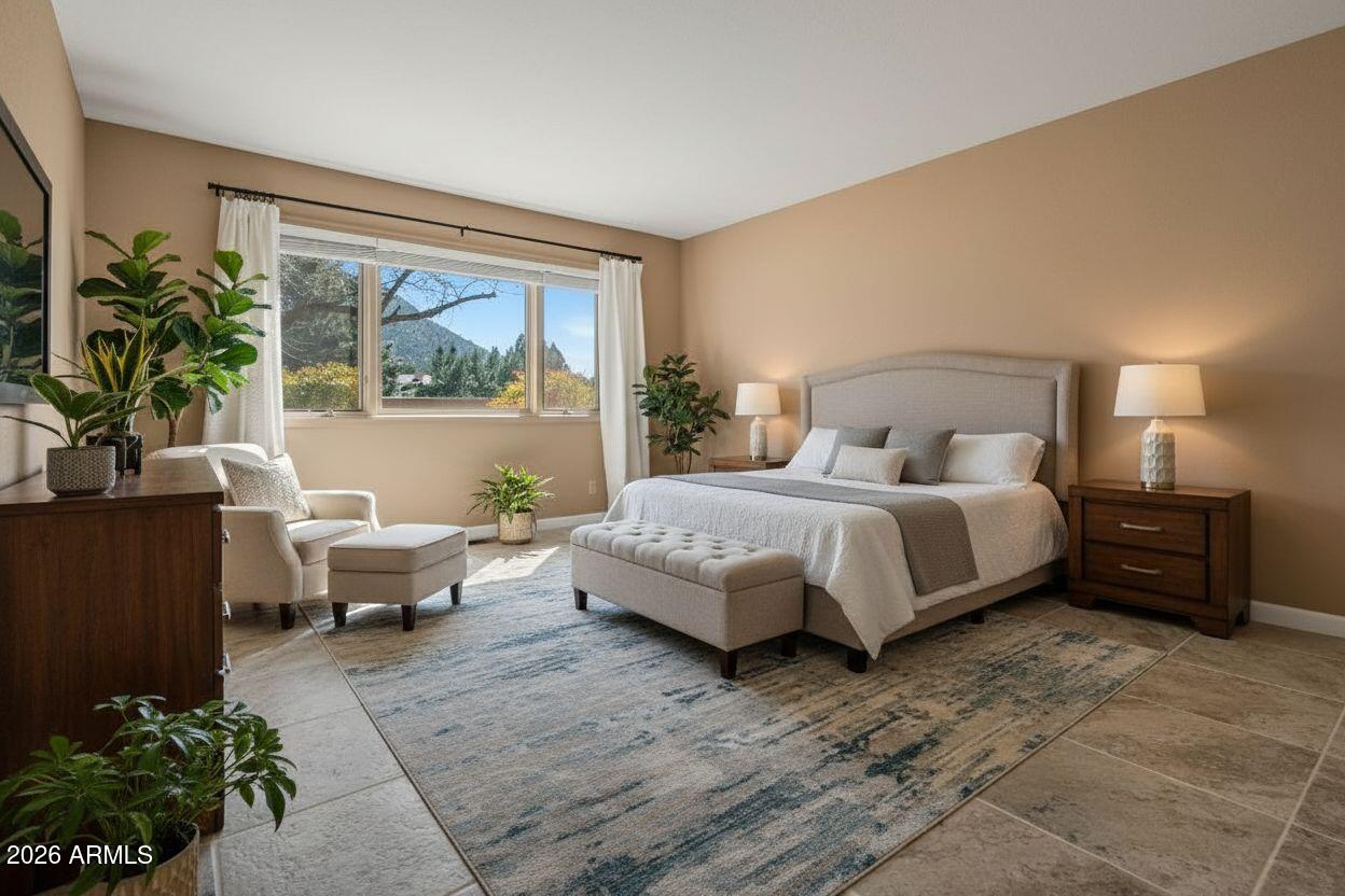 56 Red River Road Sedona, AZ 86351 - Photo 7 of 48 a bedroom with a bed and a couch