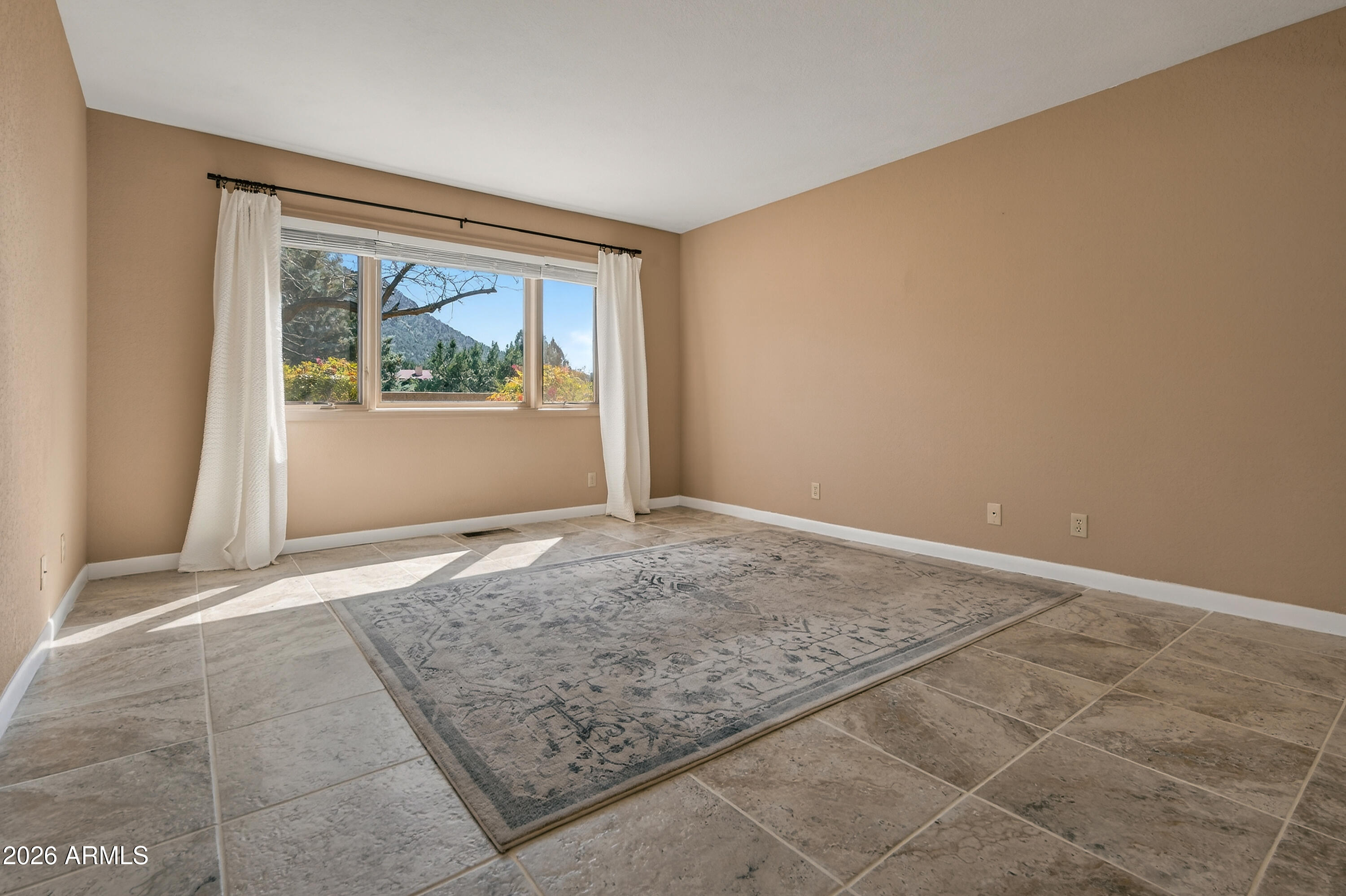 56 Red River Road Sedona, AZ 86351 - Photo 8 of 48 an empty room with large window