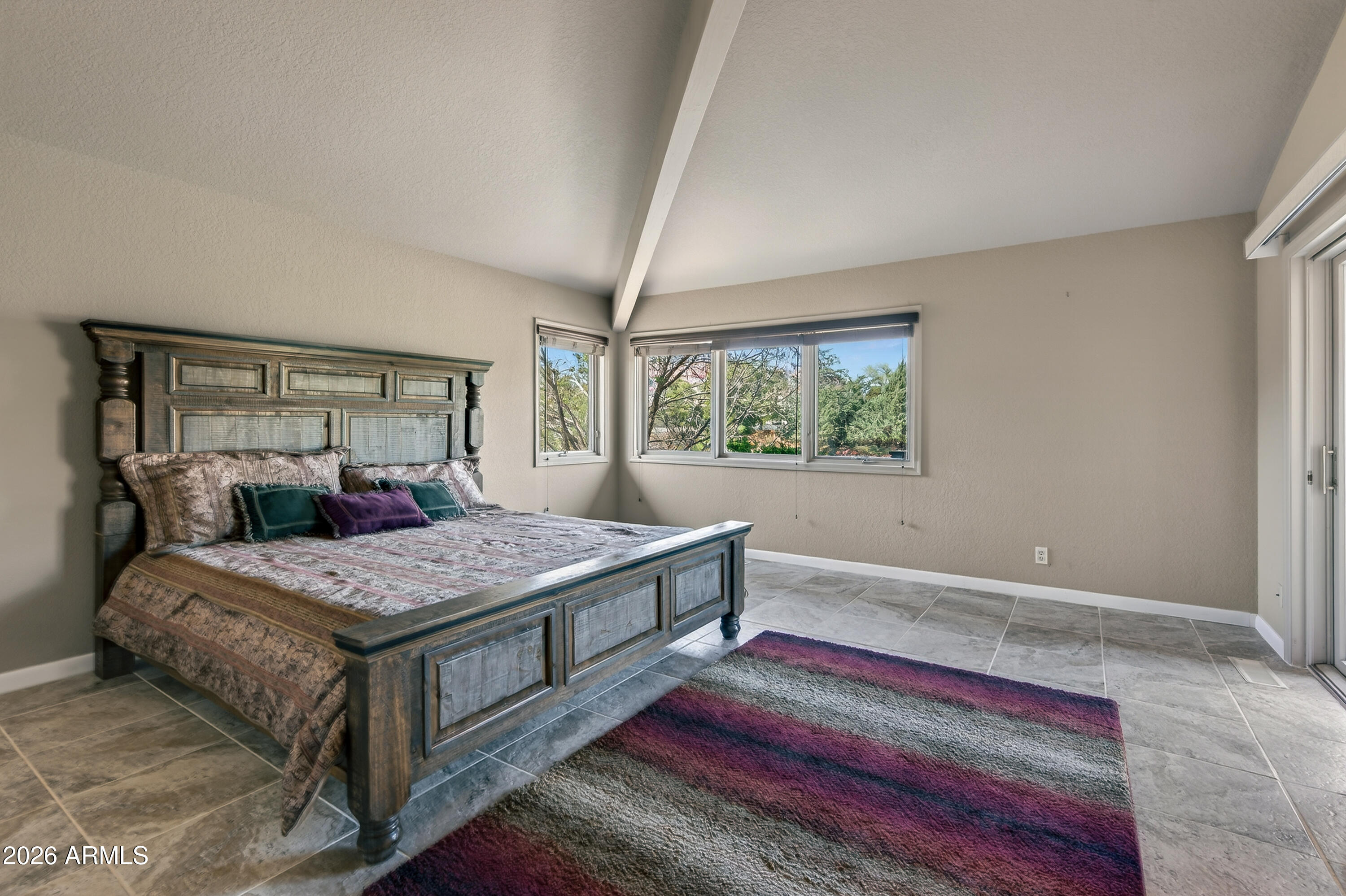 56 Red River Road Sedona, AZ 86351 - Photo 10 of 48 a bedroom with a bed and window