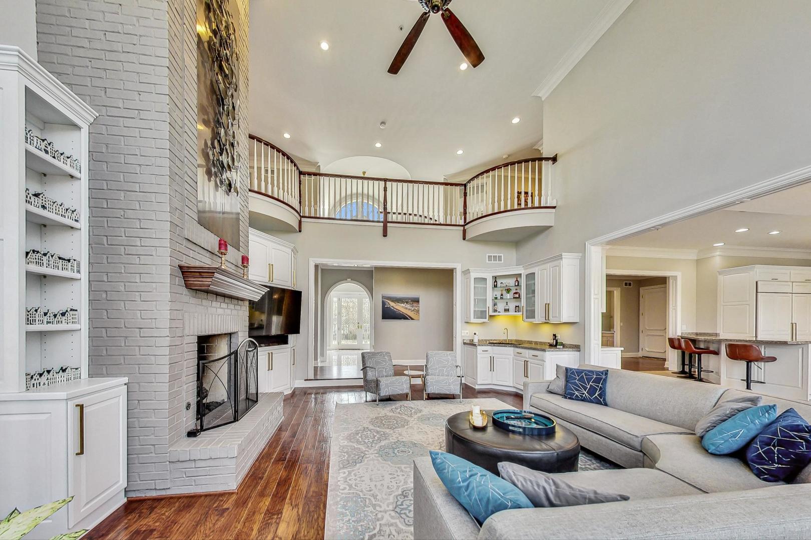 4454 Kettering Drive Long Grove, IL 60047 - Photo 13 of 44 a living room with fireplace furniture and a wooden floor