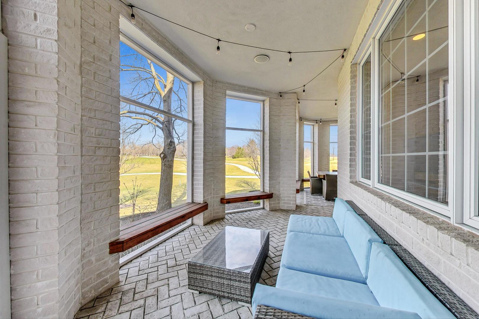 4454 Kettering Drive Long Grove, IL 60047 - Photo 35 of 44 a living room with furniture and a window