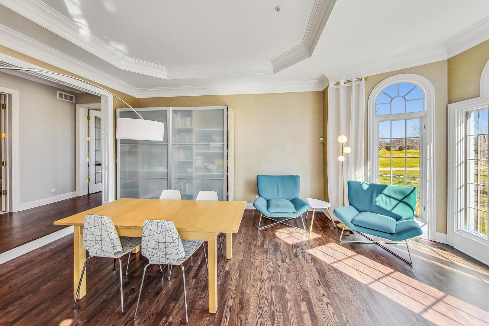 4454 Kettering Drive Long Grove, IL 60047 - Photo 5 of 44 a view of a dining room with furniture window and wooden floor