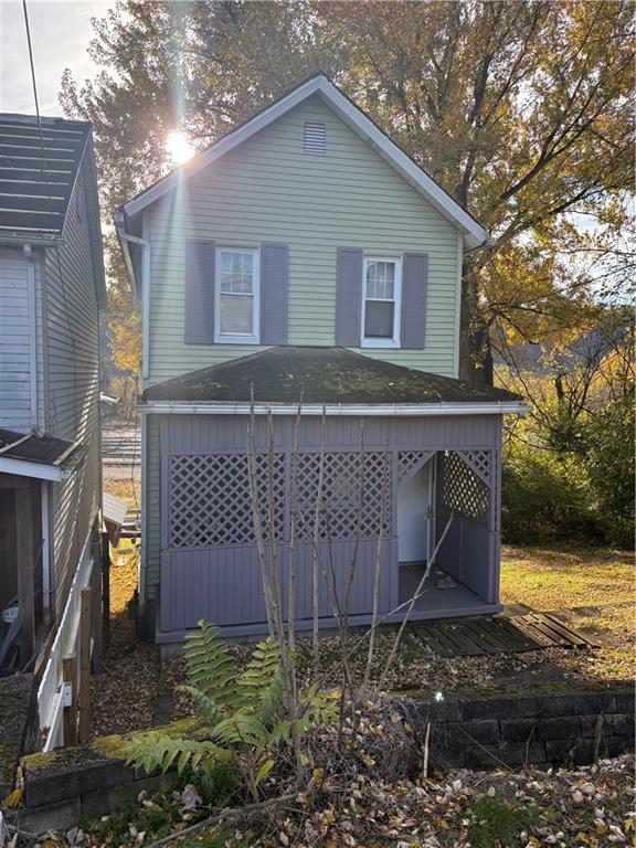 4 Howe Street Elrama, PA 15038 - Photo 2 of 9 a view of a house with a yard
