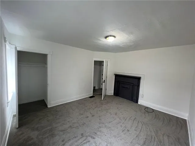 a view of empty room with front door