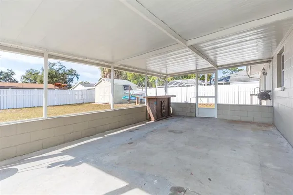 a view of a porch with porch and furniture