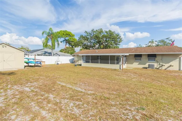 a view of a house with swimming pool