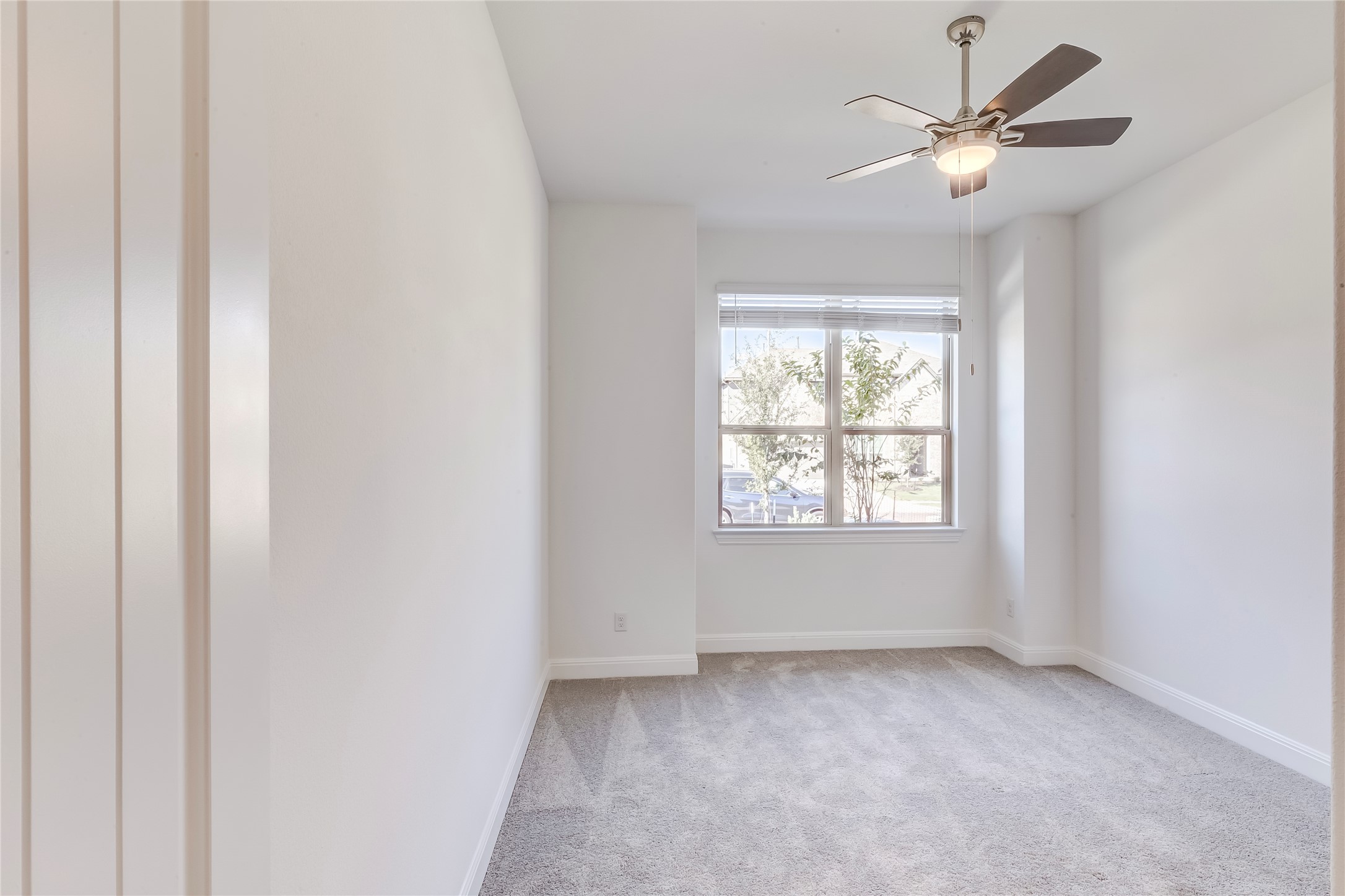 920 Old Gdn Road Leander, TX 78641 - Photo 23 of 39 Unfurnished room with light carpet and a ceiling fan