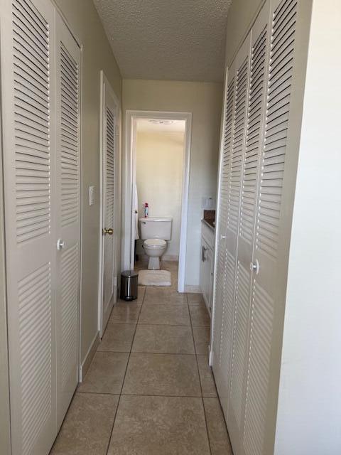 3100 North Pine Island Road, Unit 301 Sunrise, FL 33351 - Photo 9 of 9 LC MASTER BATH ,WALKING CLOSETS
