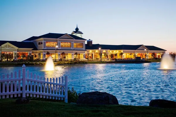 an aerial view of lake residential houses with outdoor space and river