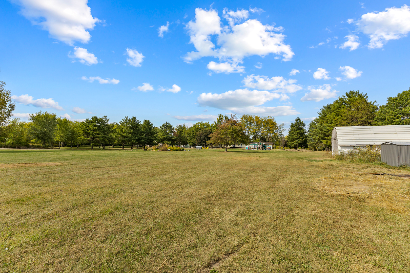 6610 Cherry Valley Road Kingston, IL 60145 - Photo 32 of 37 a view of an ocean and trees