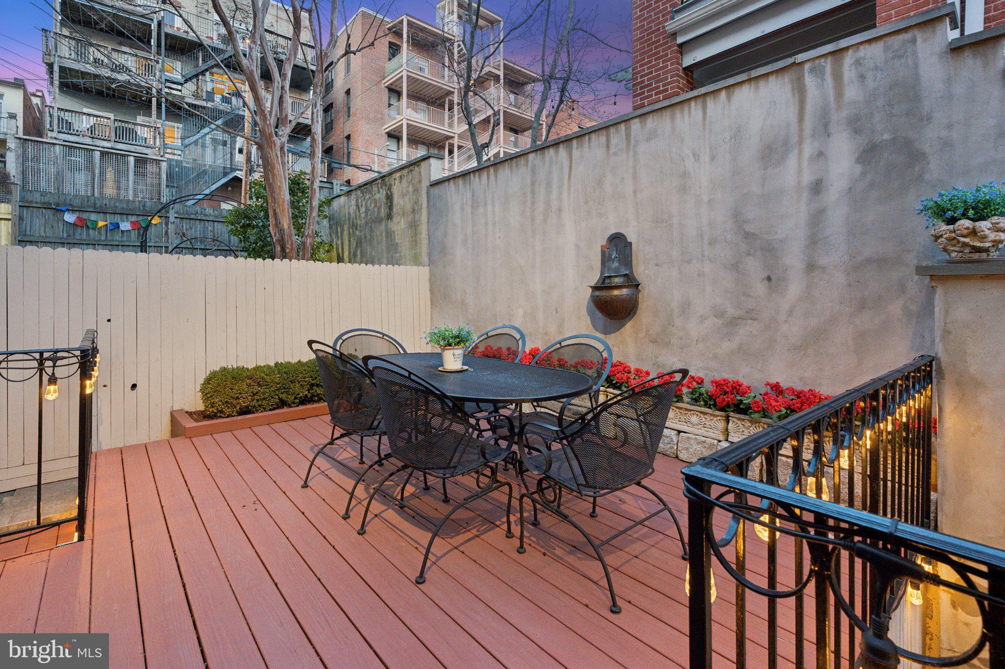 2001 19th Street Northwest, Unit 4 Washington, DC 20009 - Photo 17 of 42 a view of balcony with furniture and wooden floor