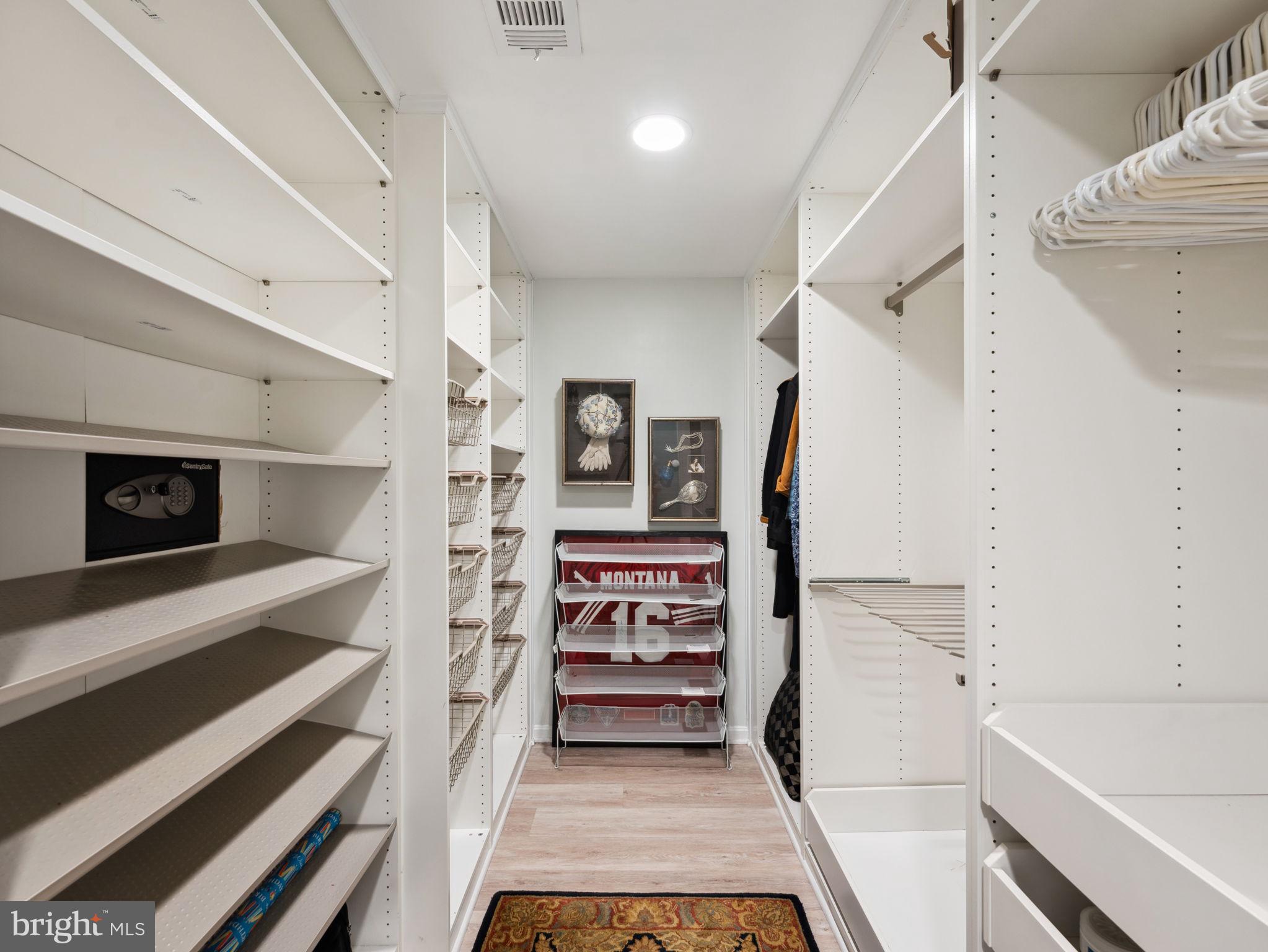 2001 19th Street Northwest, Unit 4 Washington, DC 20009 - Photo 26 of 42 a view of walk in closet and kitchen view