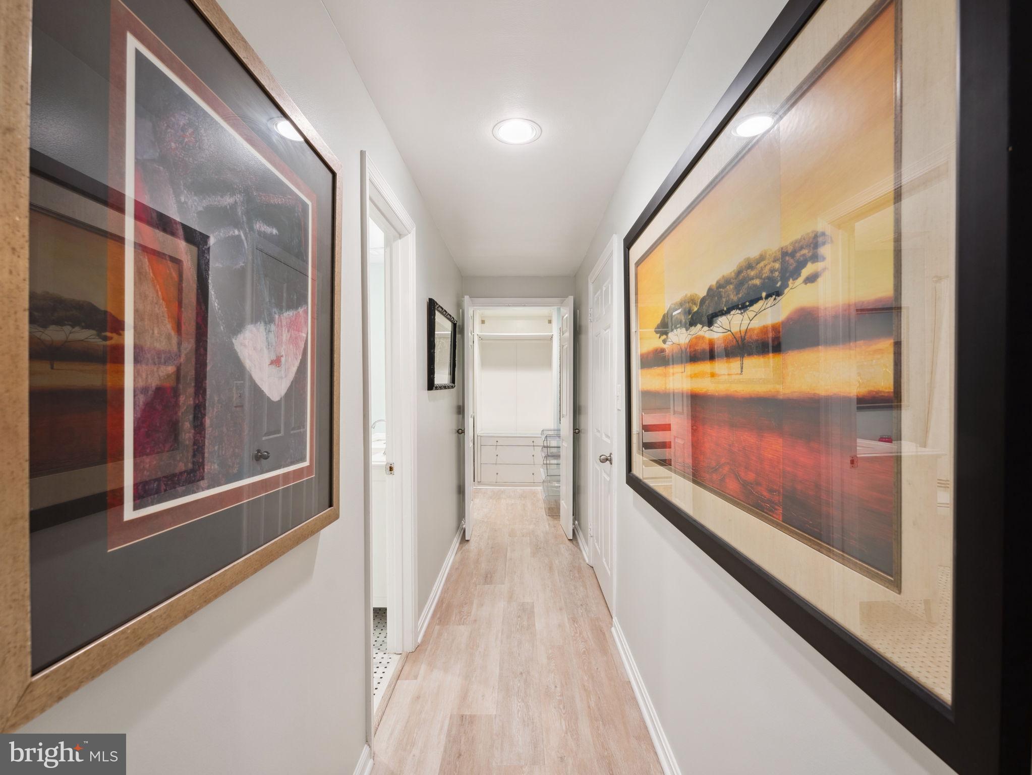 2001 19th Street Northwest, Unit 4 Washington, DC 20009 - Photo 27 of 42 a view of a large room with wooden floor and windows