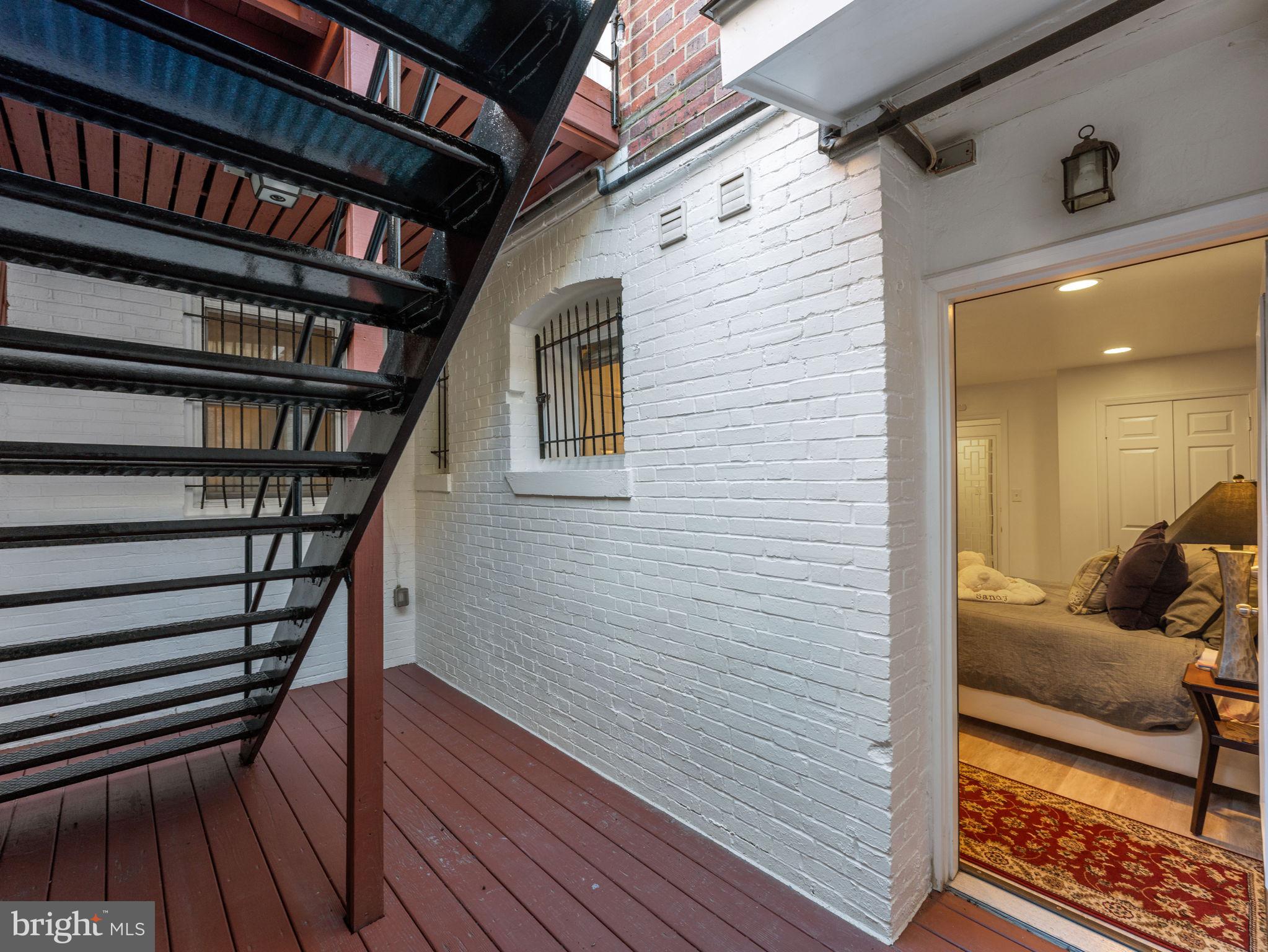 2001 19th Street Northwest, Unit 4 Washington, DC 20009 - Photo 36 of 42 a view of living room and wooden floor