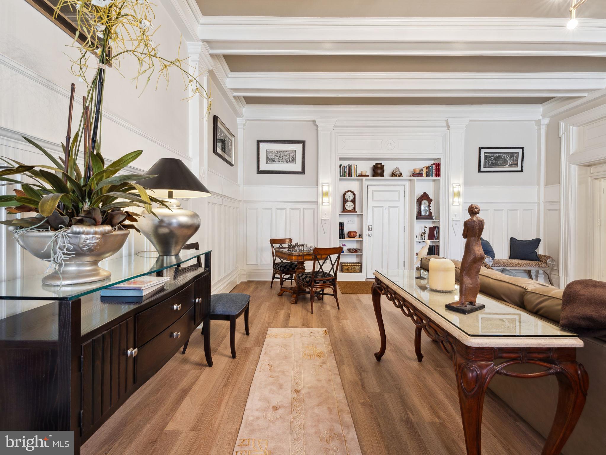 2001 19th Street Northwest, Unit 4 Washington, DC 20009 - Photo 7 of 42 a living room with furniture and wooden floor