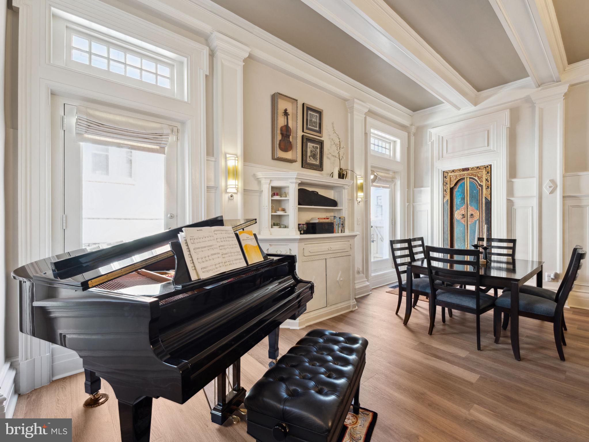 2001 19th Street Northwest, Unit 4 Washington, DC 20009 - Photo 9 of 42 a living room with furniture and wooden floor