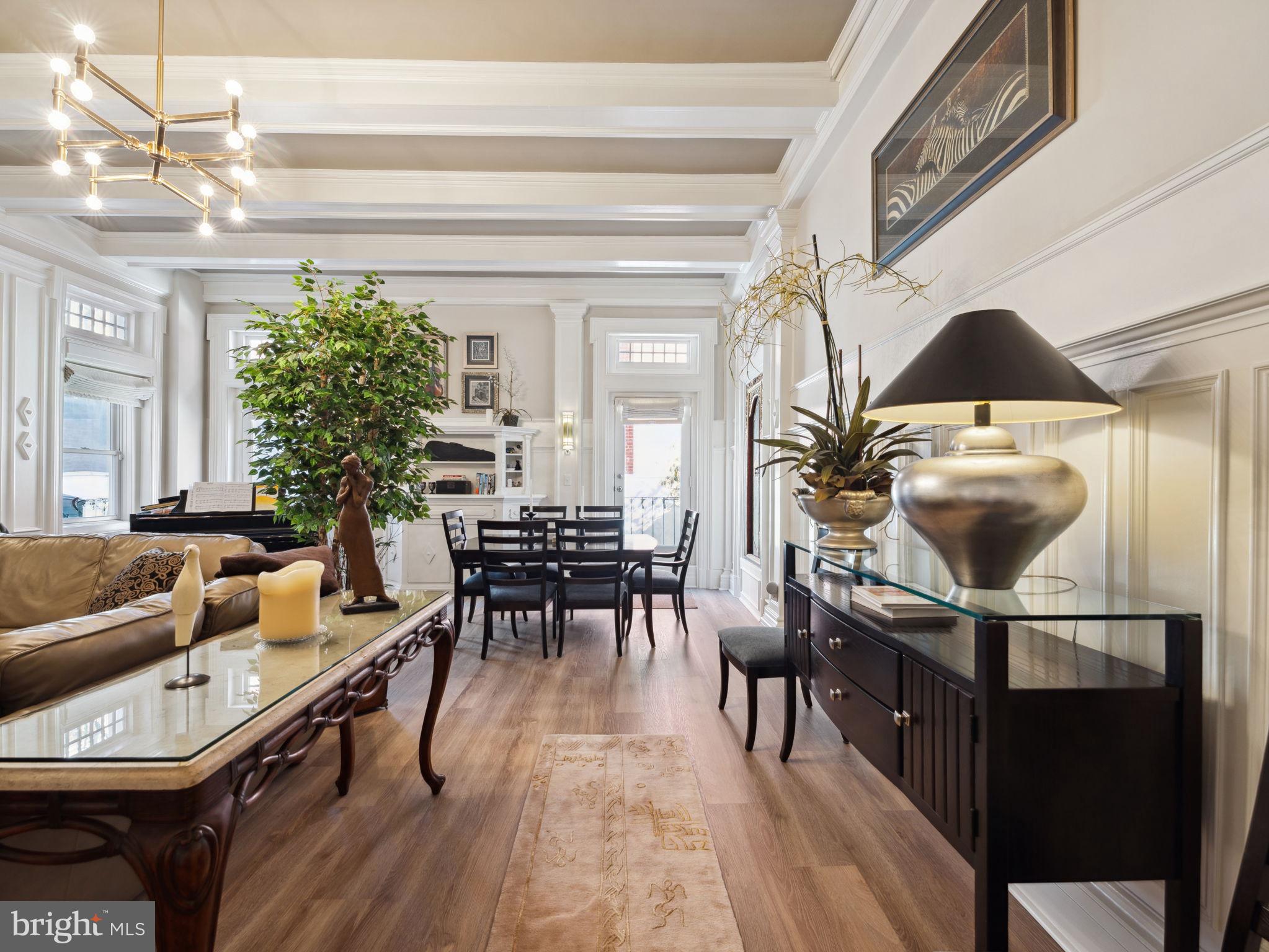 2001 19th Street Northwest, Unit 4 Washington, DC 20009 - Photo 10 of 42 a living room with furniture and wooden floor