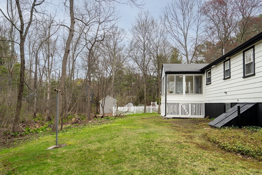 544 Pearl Street Reading, MA 01867 - Photo 22 of 24 a view of house with backyard