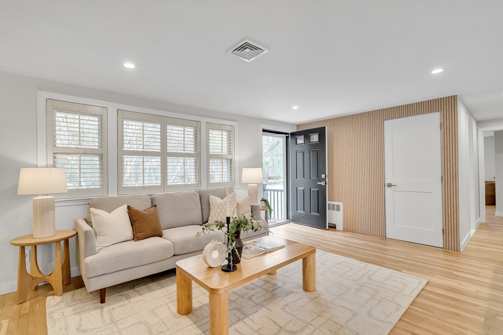 544 Pearl Street Reading, MA 01867 - Photo 3 of 24 a living room with furniture and a large window