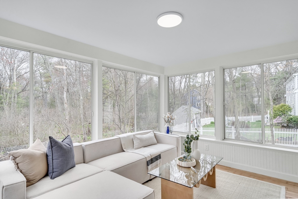 544 Pearl Street Reading, MA 01867 - Photo 9 of 24 a living room with furniture and a large window