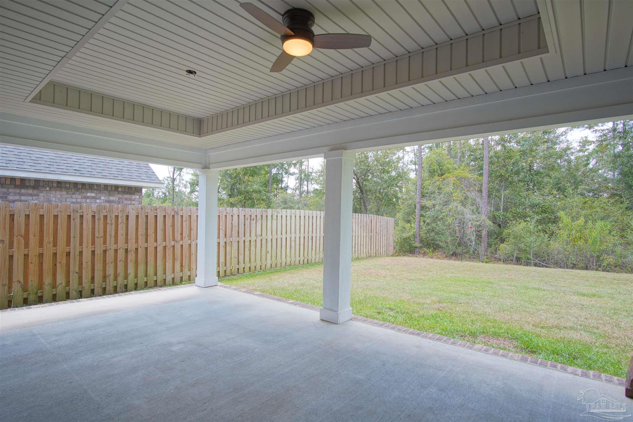 5734 Dunridge Drive Pace, FL 32571 - Photo 22 of 26 a view of an empty room with a balcony