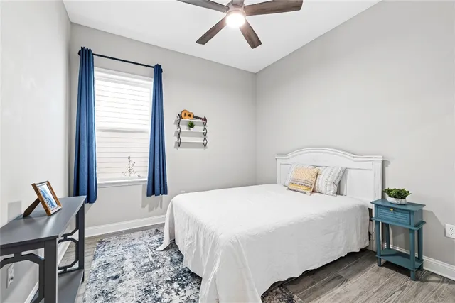 a view of a backyard with sitting area