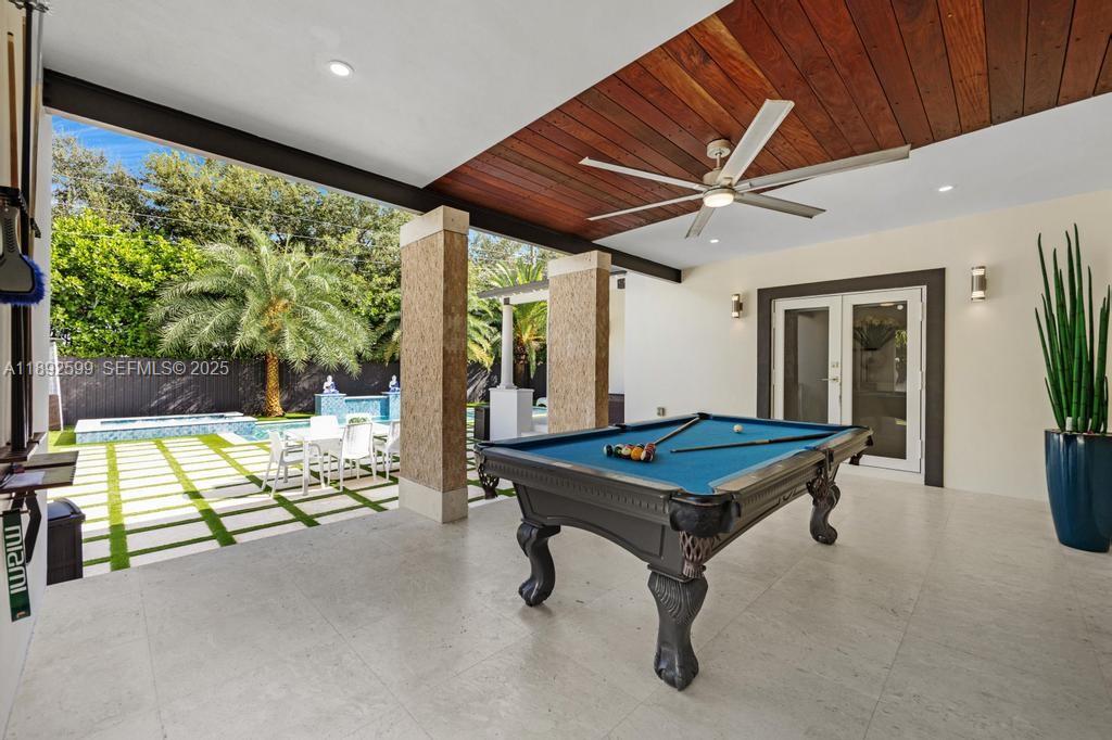 155 West 60th Street Hialeah, FL 33012 - Photo 15 of 29 a room with table and wooden floor