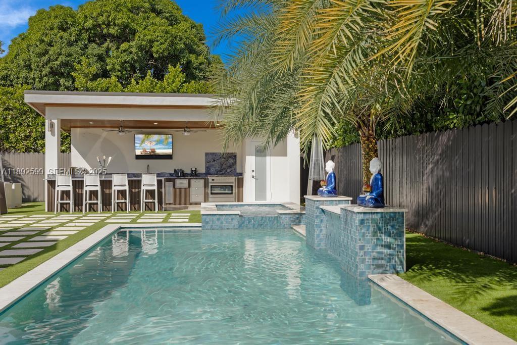 155 West 60th Street Hialeah, FL 33012 - Photo 5 of 29 swimming pool view with a seating space