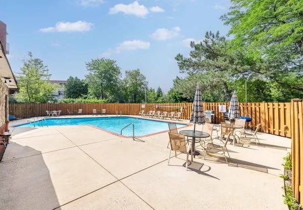 a backyard of a house with lots of green space and garden view