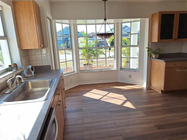a view of entryway with wooden floor
