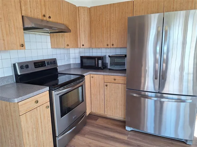 a bathroom with a sink a vanity and a mirror
