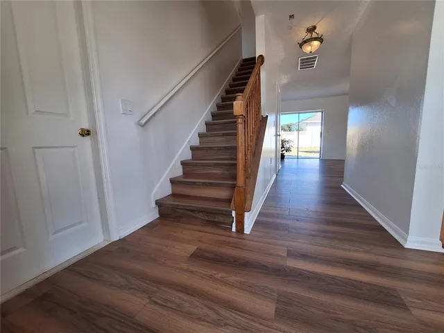 a bathroom with a shower and a toilet