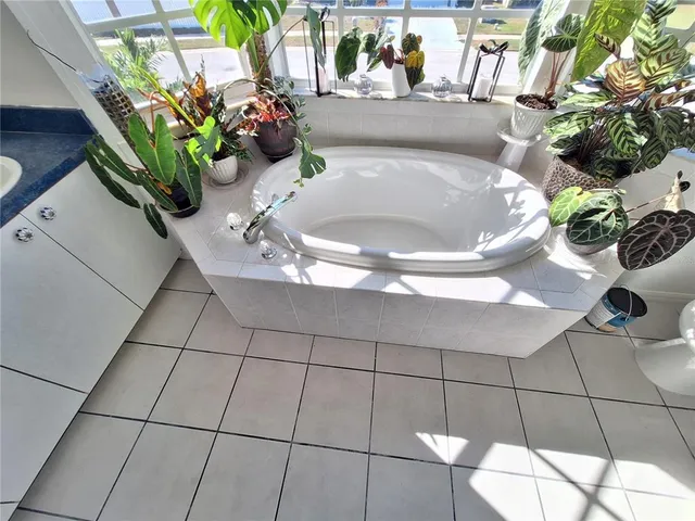 a view of a wooden floor and a lake view