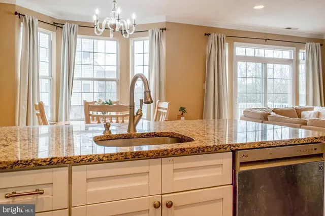 a kitchen with sink and window