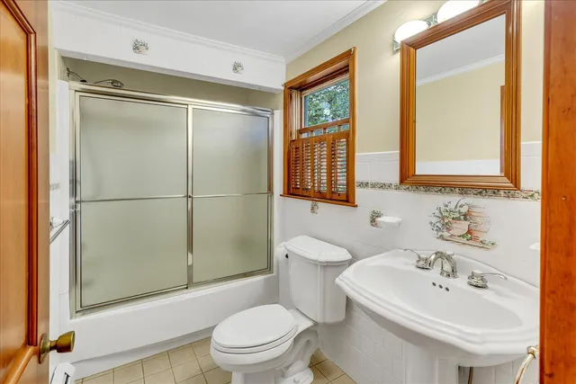 a kitchen with granite countertop cabinets sink and window