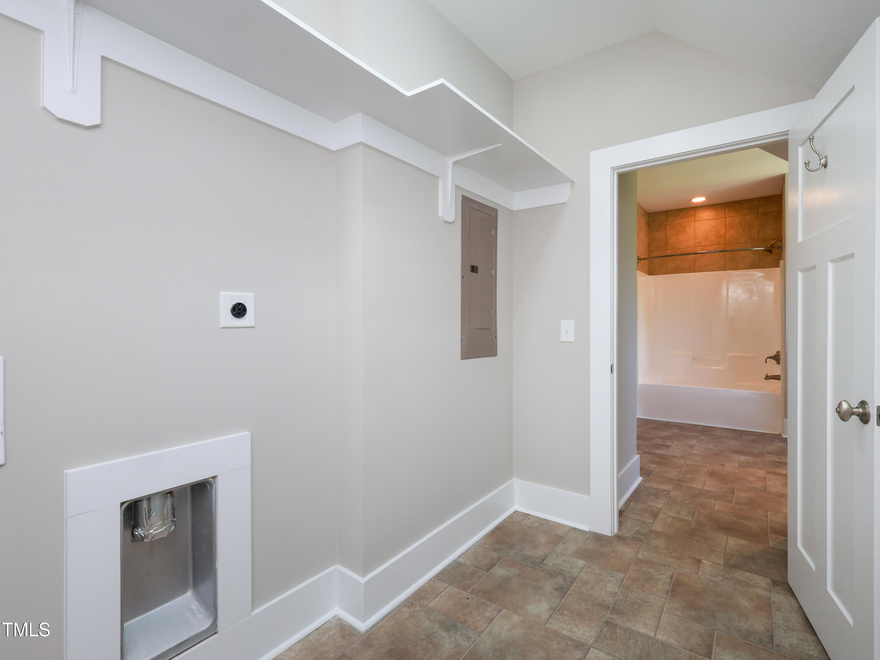912 Reedy Creek Road Cary, NC 27513 - Photo 42 of 59 075_912_Reedy_Creek_Rd_Upstairs_Laundry_