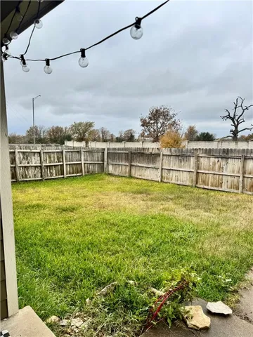 a view of a swimming pool with a garden