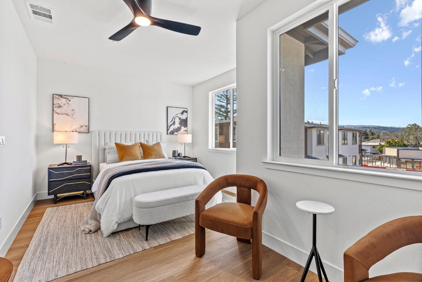 943 Woodside Road Redwood City, CA 94061 - Photo 25 of 30 a bedroom with furniture and a wooden floor