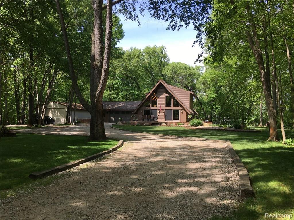 4306 Cordley Lake Road Pinckney, MI 48169 - Photo 50 of 52 View of the House from the Driveway