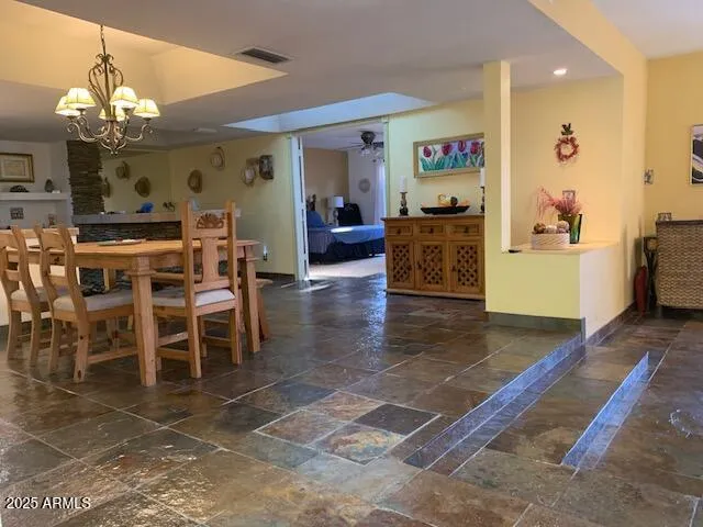 a view of a dining room with furniture