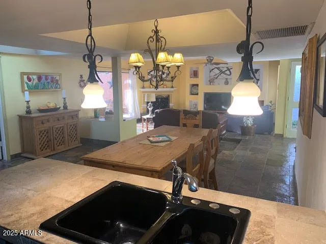 a room with table and chairs