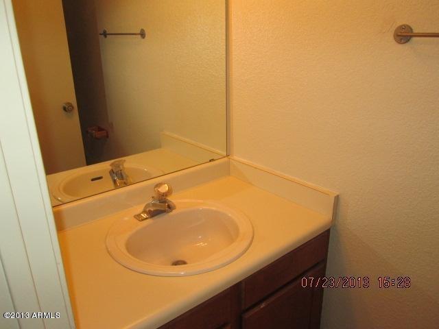 7905 West Thunderbird Road, Unit 300 Peoria, AZ 85381 - Photo 6 of 10 Downstairs Half Bath
