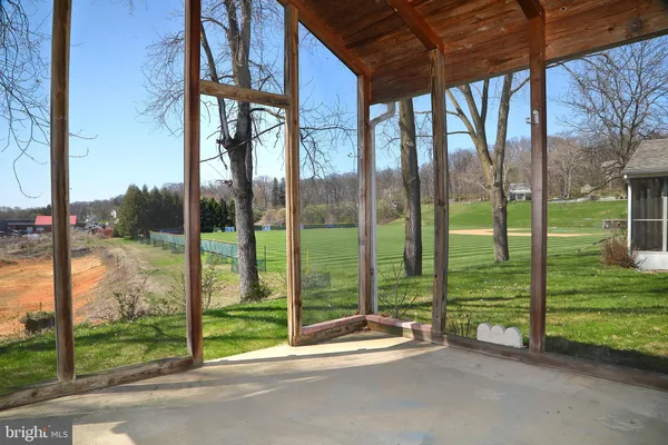 a view of a yard with porch